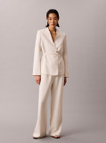White Calvin Klein for women. Refined classics for a curated wardrobe. Minimalist essentials in signature silhouettes  Women