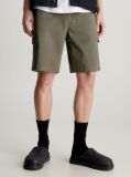 Green Calvin Klein Essentials. Timeless staples perfected for the modern wardrobe, evolving every season with new shapes and colours. These shorts are created with 20% recycled cotton, created by reprocessing existing materials.  Men