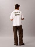 Λευκό T-shirt Σε Χαλαρή Γραμμή Με Graphic Σχέδιο "Calvins Or Nothing"  Άνδρας