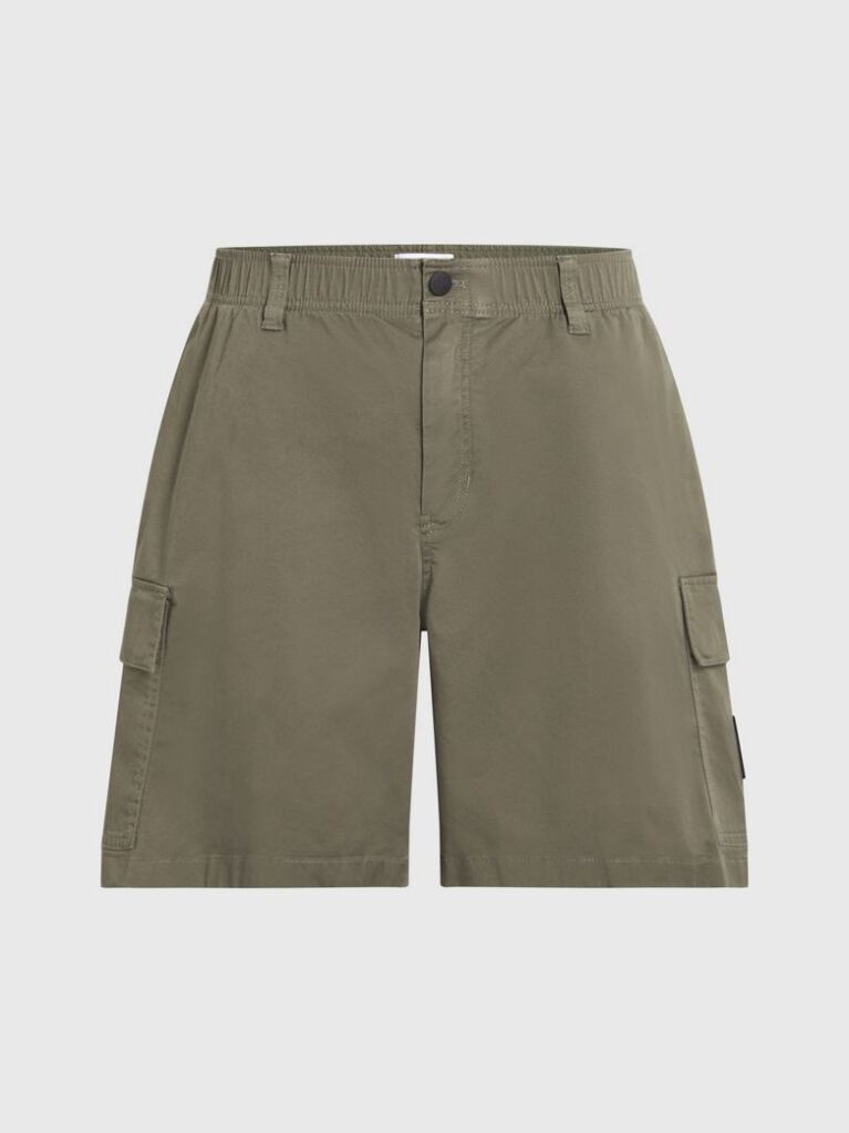 Green Calvin Klein Essentials. Timeless staples perfected for the modern wardrobe, evolving every season with new shapes and colours. These shorts are created with 20% recycled cotton, created by reprocessing existing materials.  Men